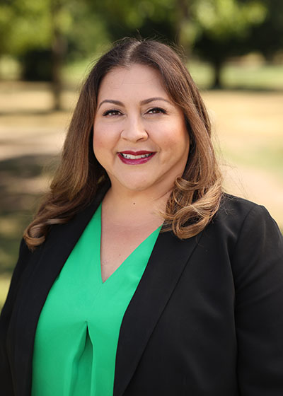 Carmen Rubio in a green shirt (portrait)