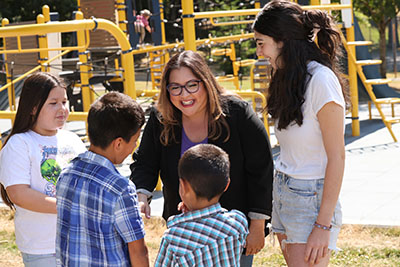 Carmen Rubio with kids at playground